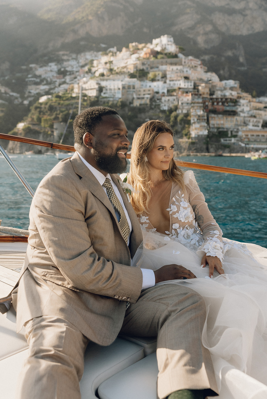 A bride and groom on their way to the ceremony on the Italian Coast.