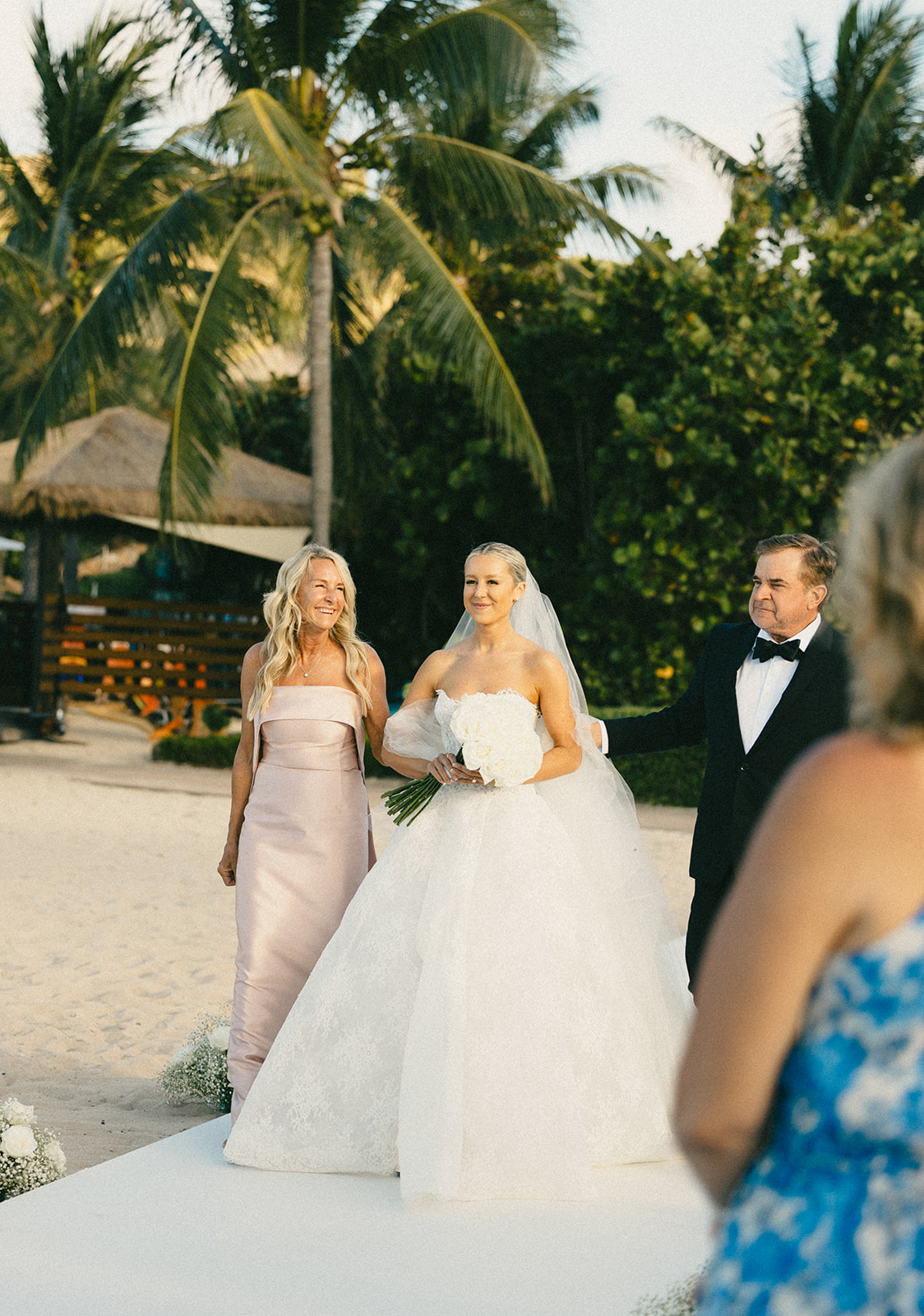 Bride walking down the aisle at luxury destination wedding in Virgin Gorda